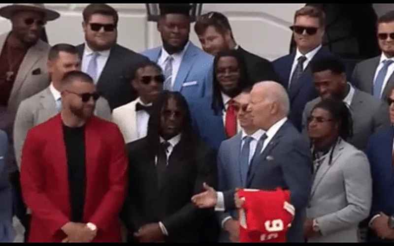  BIDEN DELIVERS MORE DELUSION, SHAKES HANDS WITH THE AIR DURING VISIT WITH KC CHIEFS