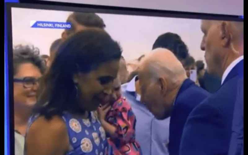  NEWSMAX HOST NEARLY LOSES IT IN COVERAGE OF BIDEN NIBBLING FRIGHTENED YOUNG GIRL