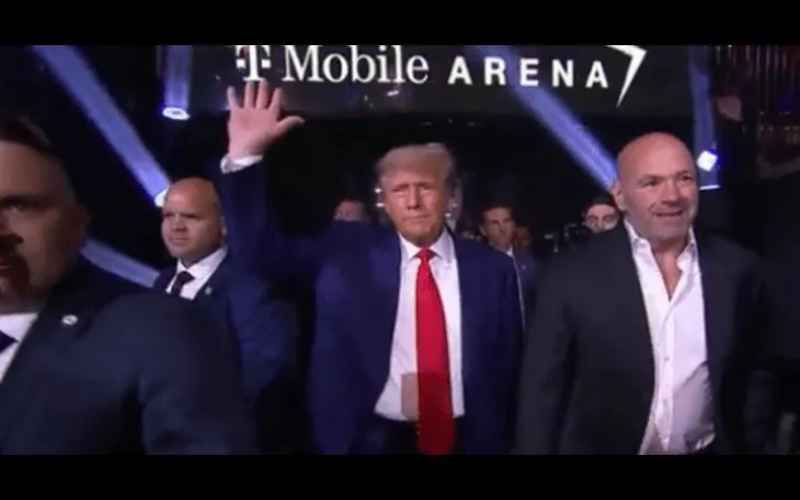 TRUMP ENTERS TO CHEERS AT UFC VS. WHILE BIDEN SHUFFLES ALONG AT BEACH