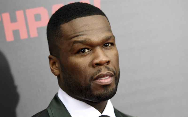  50 CENT EVISCERATES BIDEN FOR GOING TO THE BEACH AS THE WORLD IMPLODES