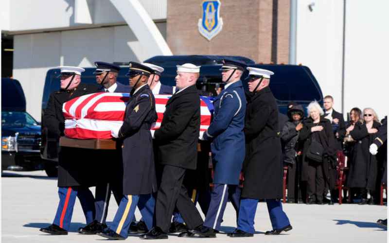  Carter’s Casket Arrives at Capitol, Where He Will Lie in State